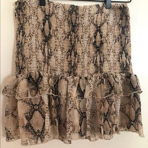 Lulu’s snakeskin smocked and ruffled skirt
